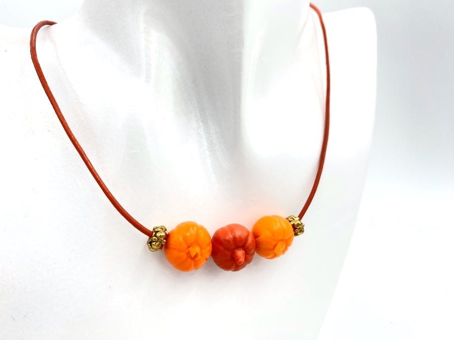 Handmade necklace on leather cord with three pumpkin beads - Ornamentico shop