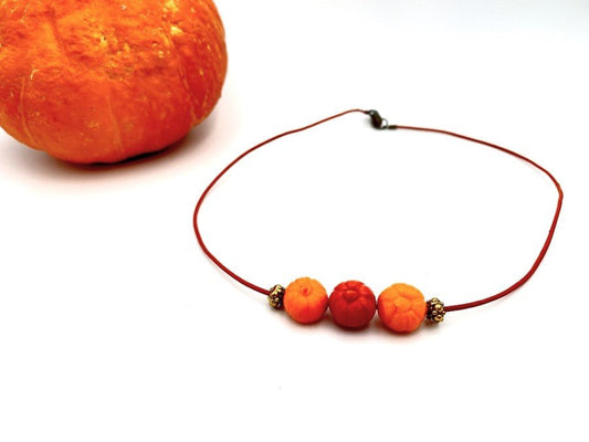 Handmade necklace on leather cord with three pumpkin beads - Ornamentico shop