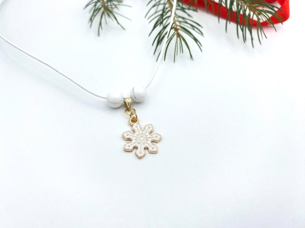 Handmade leather necklace with charm in the shape of a snowflake accented with two natural stone beads - Ornamentico shop