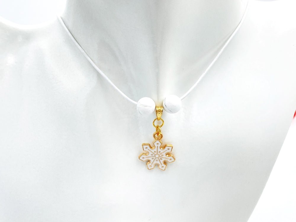Handmade leather necklace with charm in the shape of a snowflake accented with two natural stone beads - Ornamentico shop