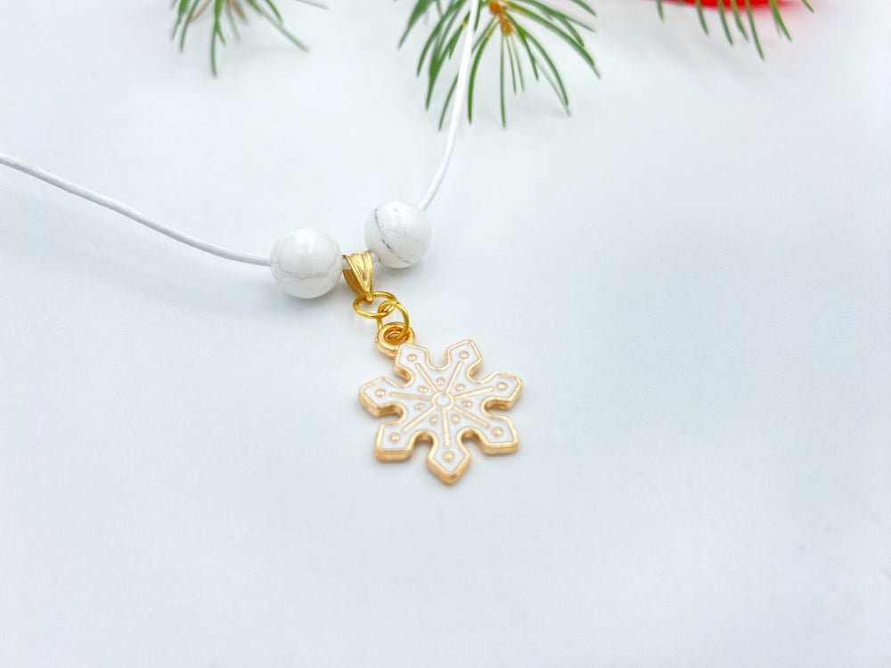 Handmade leather necklace with charm in the shape of a snowflake accented with two natural stone beads - Ornamentico shop
