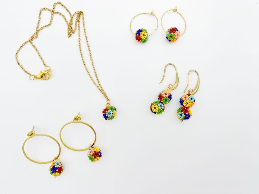 Handmade pendant "Flowerbed" is crafted from beads on gold plated chain - Ornamentico shop