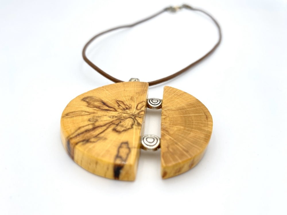 Unique handmade round wooden pendant with silver inlays. Made of carefully polished and varnished wood - Ornamentico shop