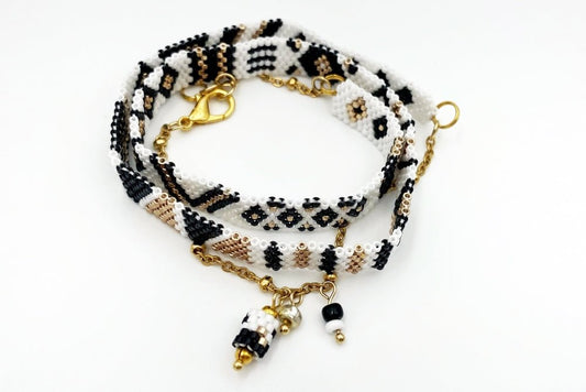 Jewelry set of bracelet and two rings made in geometrical design from black, white and gold Miyuki beads - Ornamentico shop