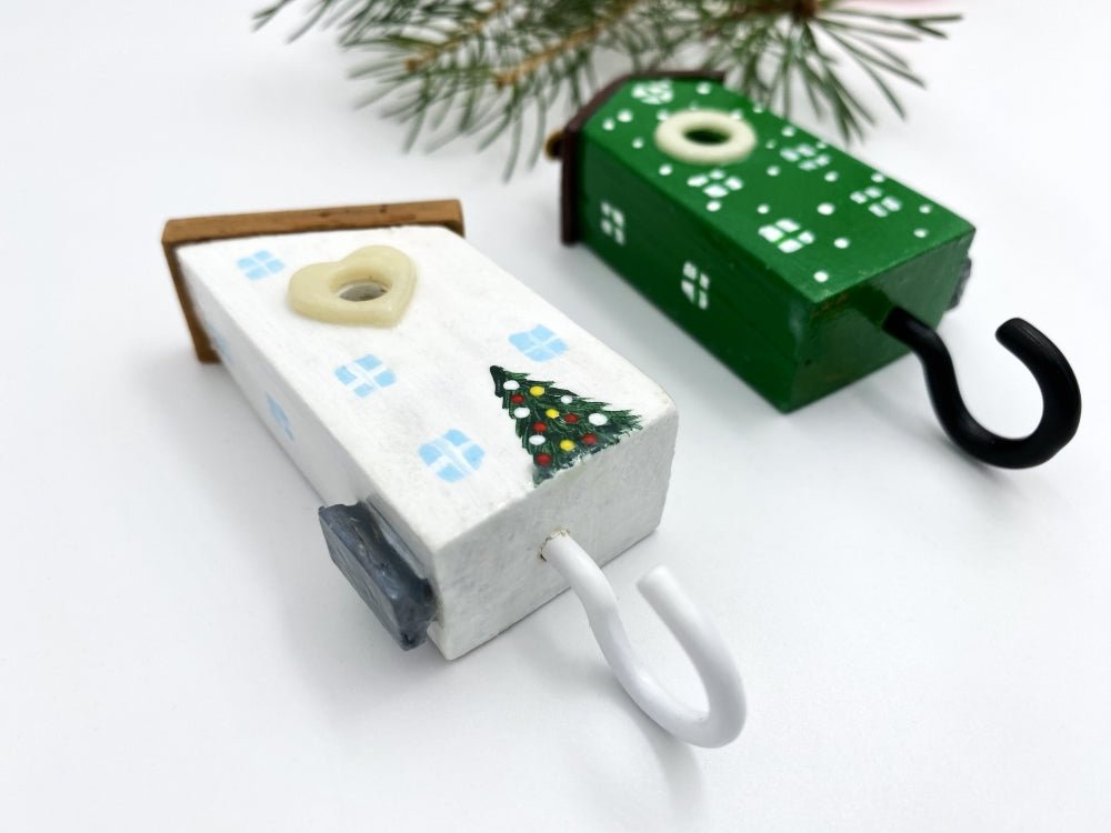 Set of two wooden hooks made in the shape of small houses decorated for Christmas - Ornamentico shop