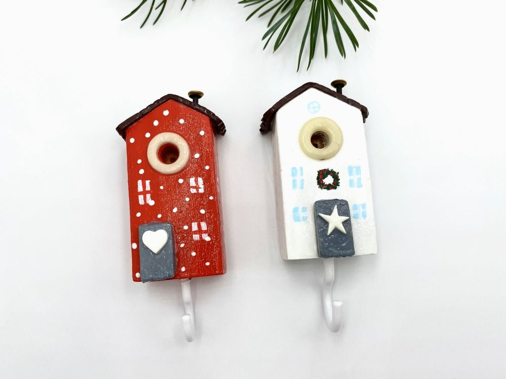 Two handmade wooden hooks in the shape of Christmas decorated houses - Ornamentico shop