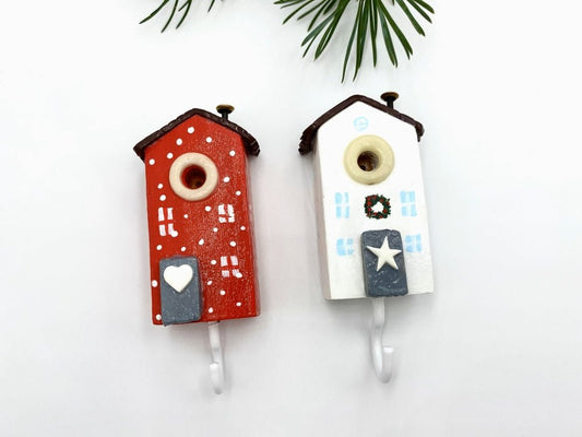 Two handmade wooden hooks in the shape of Christmas decorated houses - Ornamentico shop