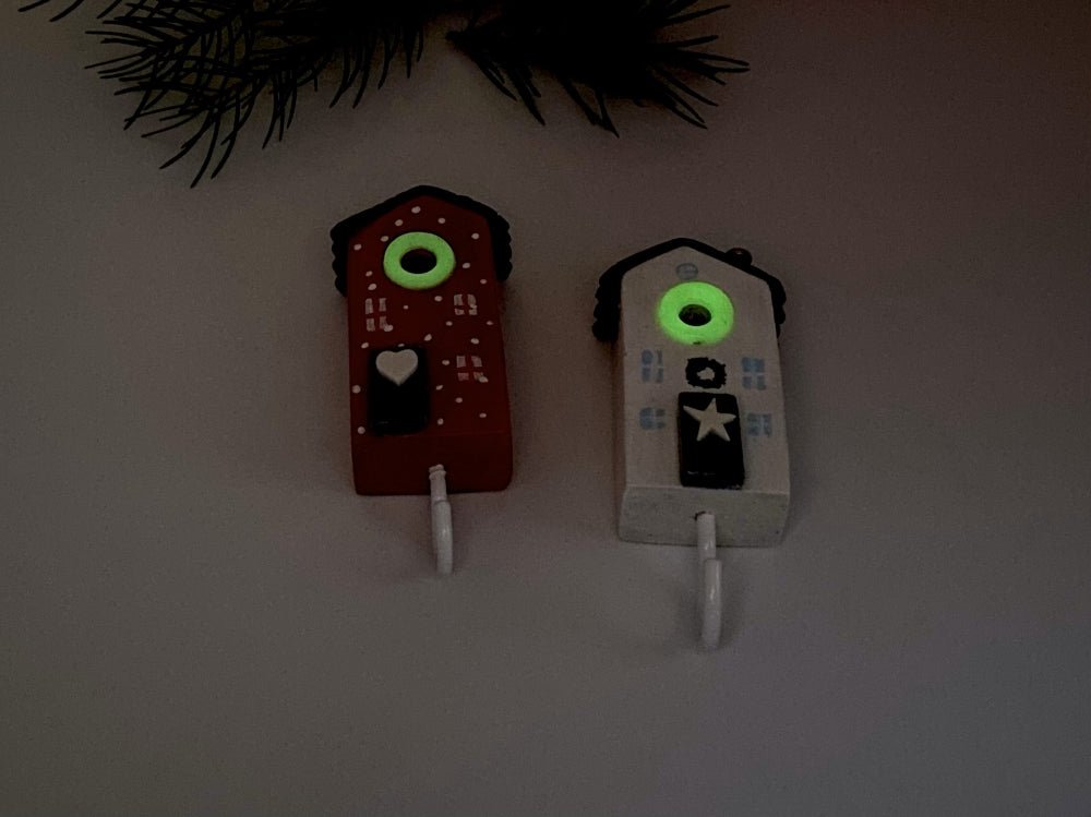 Two handmade wooden hooks in the shape of Christmas decorated houses - Ornamentico shop