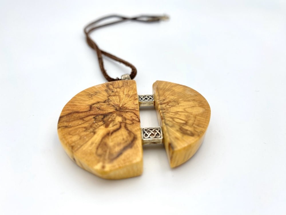 Medium size wooden pendant made from finely polished wood with silver inlays on a woven leather strap - Ornamentico shop