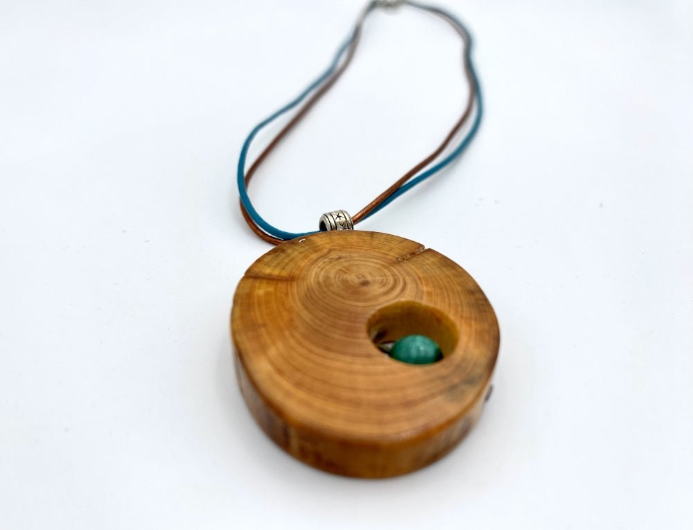 Handmade small wooden pendant crafted from polished and lacquered beech wood - Ornamentico shop