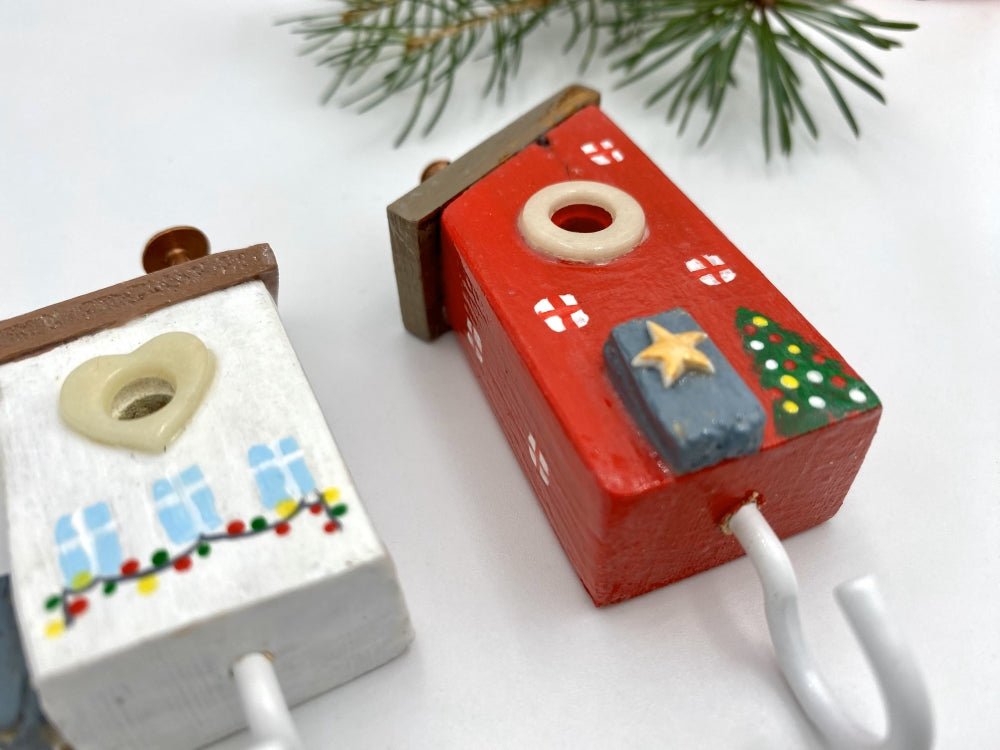 Two handmade wooden painted hooks in the shape of decorated houses - Ornamentico shop