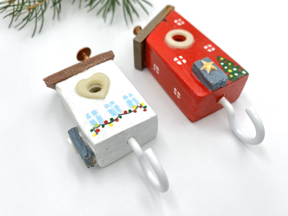 Two handmade wooden painted hooks in the shape of decorated houses - Ornamentico shop