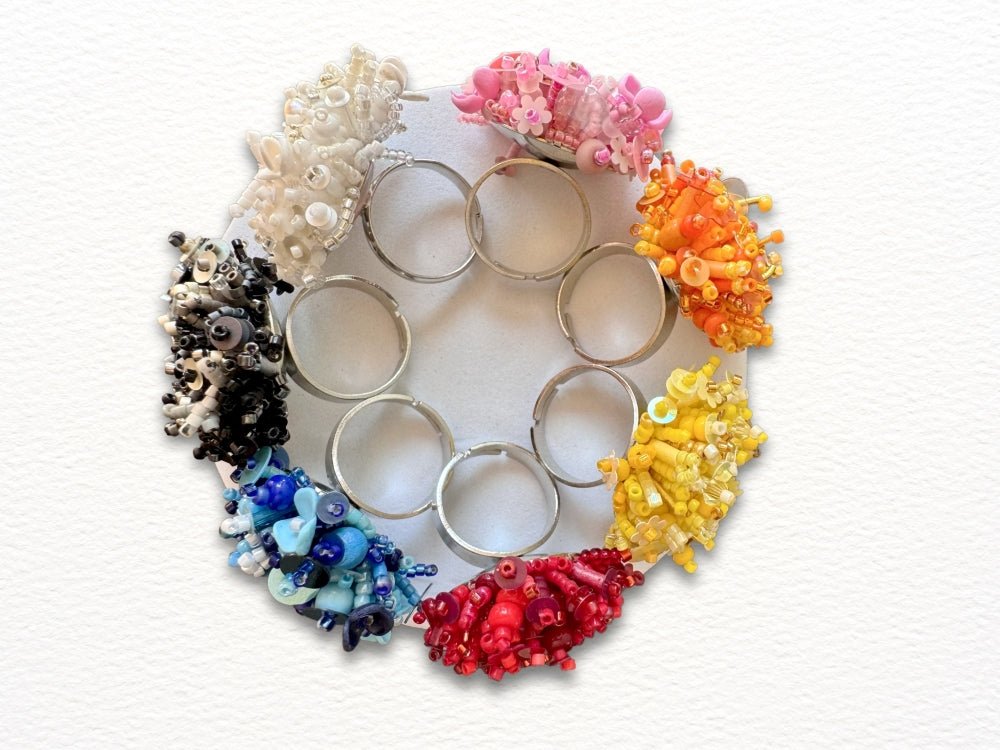A collection of hand crafted rings created in various beading techniques