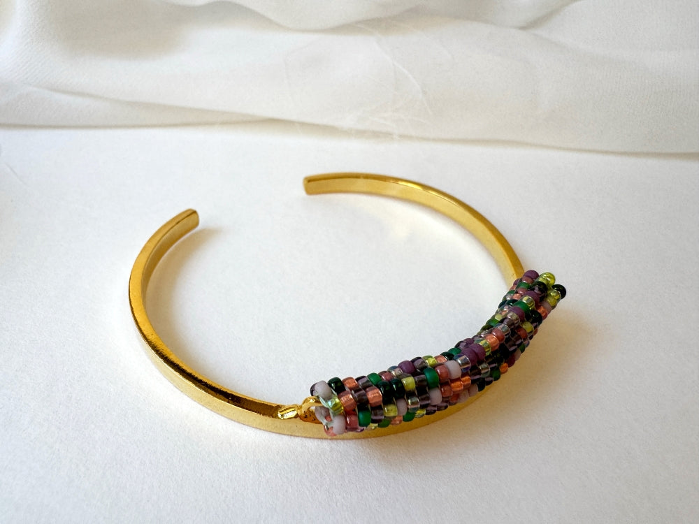 Gold-plated Indian Corn Linear bracelet with a narrow band of multicolored TOHO glass beads in green, pink, plum, copper and yellow - Ornamentico shop