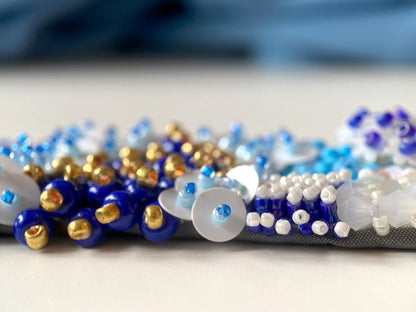 Exclusive handmade bracelet crafted from beads, sequins and rhinestones in a variety of blue and white hues using volume-beading technique - Ornamentico shop