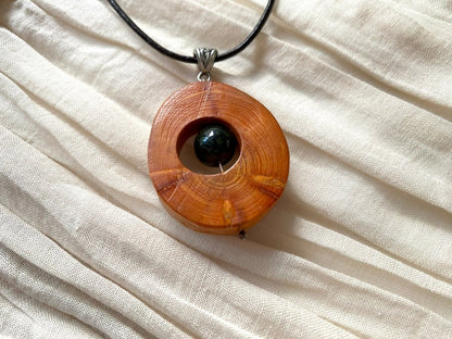 Small handmade wooden pendant with an obsidian bead - Ornamentico shop 