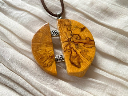 Medium size wooden pendant made from finely polished wood with silver inlays on a woven leather strap - Ornamentico shop