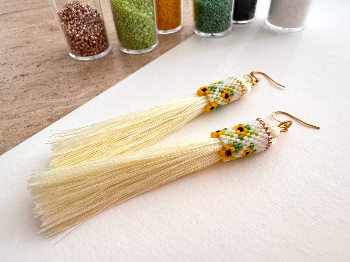 Tassel earrings with beaded element crafted in peyote stitch technique fearing bright sunflower ornament