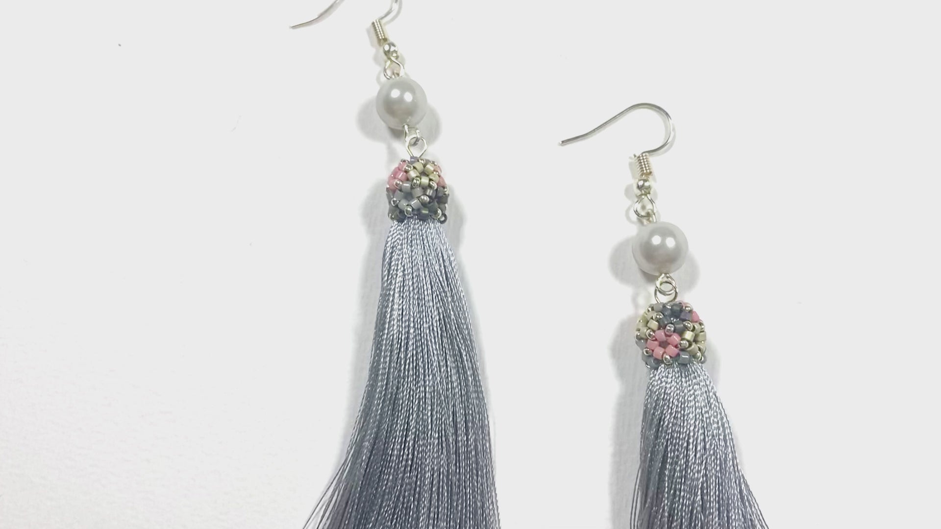Handmade earrings are crafted from shimmering silver grey tassel which is covered with a floral cap from beads - Ornamentico shop