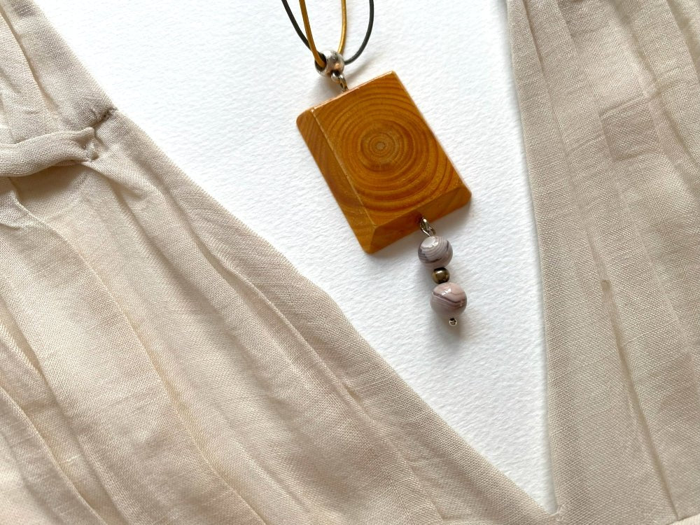 Handmade small wooden pendant crafted from beech wood. Complimented with two agate stones - Ornamentico shop