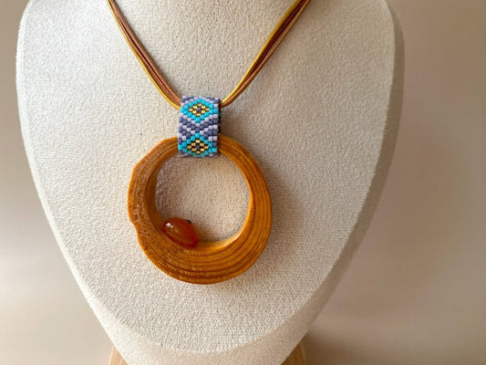 Wooden pendant with amber, crafted from polished and lacquered beech wood - Ornamentico shop