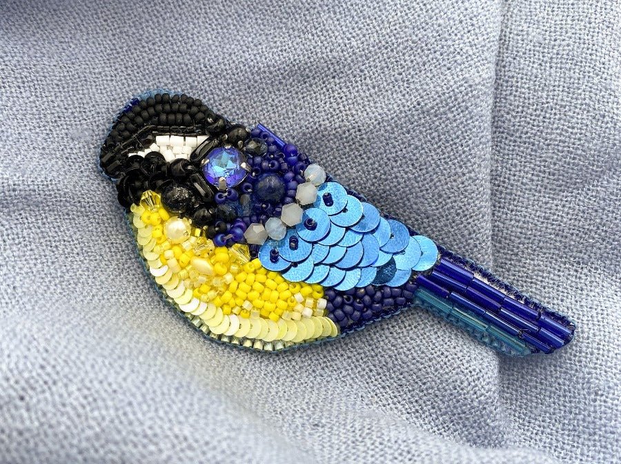 This beautiful handmade brooch features a colorful depiction of a Great Tit - Ornamentico shop