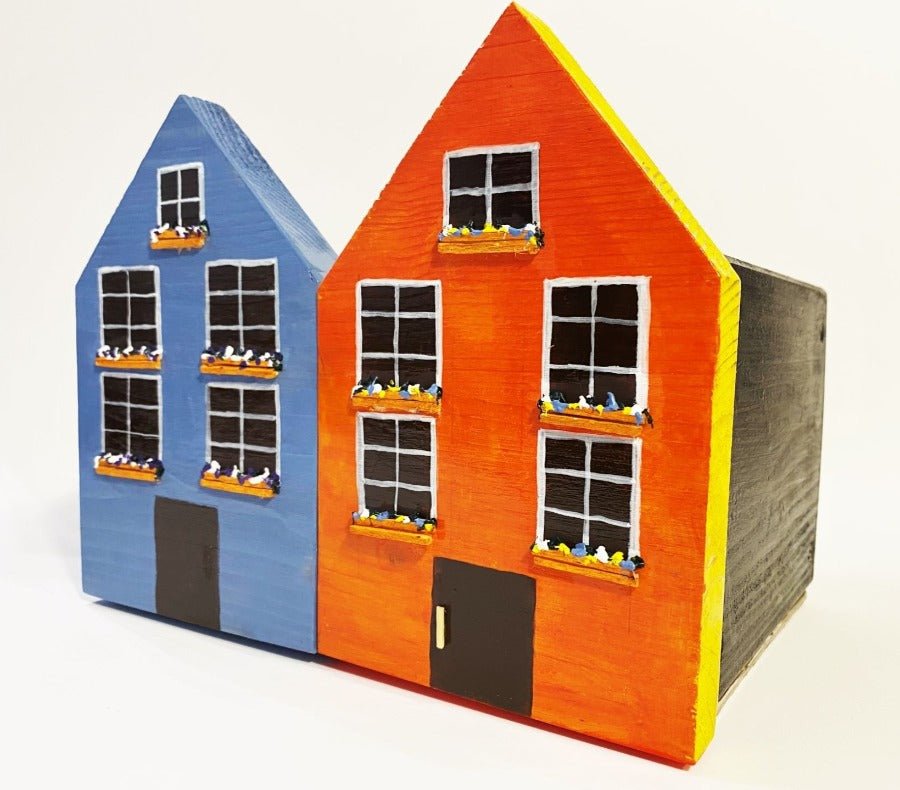 Hand painted wooden box for small items storage shaped as a house.