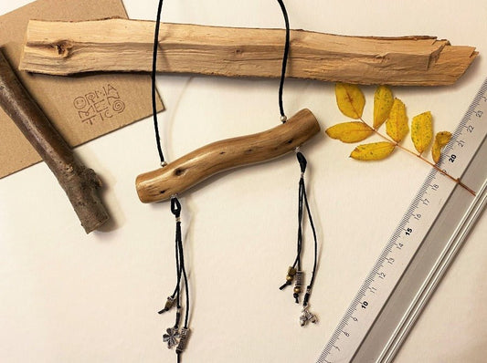 Boho style wooden pendant with silver and bronze charms. Wooden element length: 11 cm - Ornamentico shop