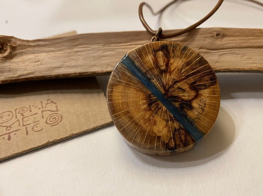 Polished and lacquered wooden pendant with sea colored epoxy inlay - Ornamentico shop