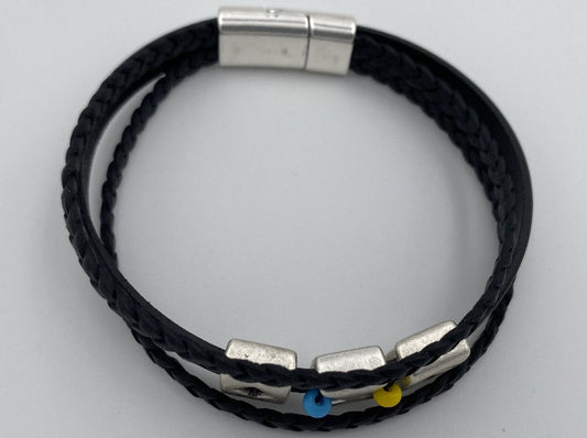 Handmade men's bracelet from leather decorated with three geometric slide beads and insert from beads. Beaded insert is made in Ukrainian flag colors - Ornamentico shop