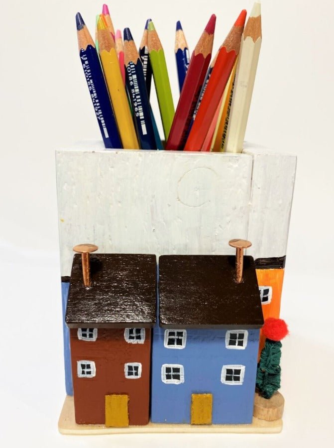 Colorful hand-painted wooden pencil box decorated with wooden houses. Wood, acrylic paints, varnish.