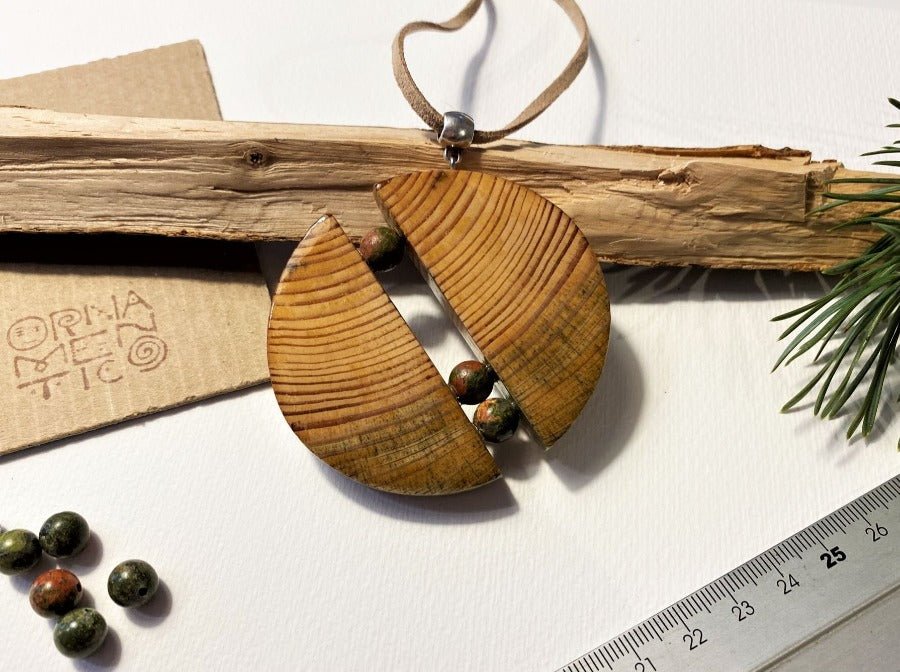 A unique wooden pendant made from finely polished wood with natural stone inlays on a suede leather strap - Ornamentico shop