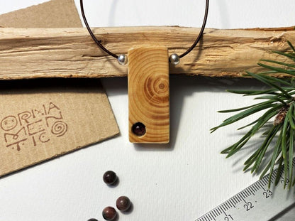 Lacquered wooden pendant with tourmaline bead. Beech wood, pink tourmaline bead, silver coated fittings - Ornamentico shop