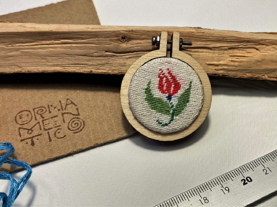 Unique handmade embroidered pendant in a round wooden frame. Collection "Ornaments of Turkey" - Ornamentico shop