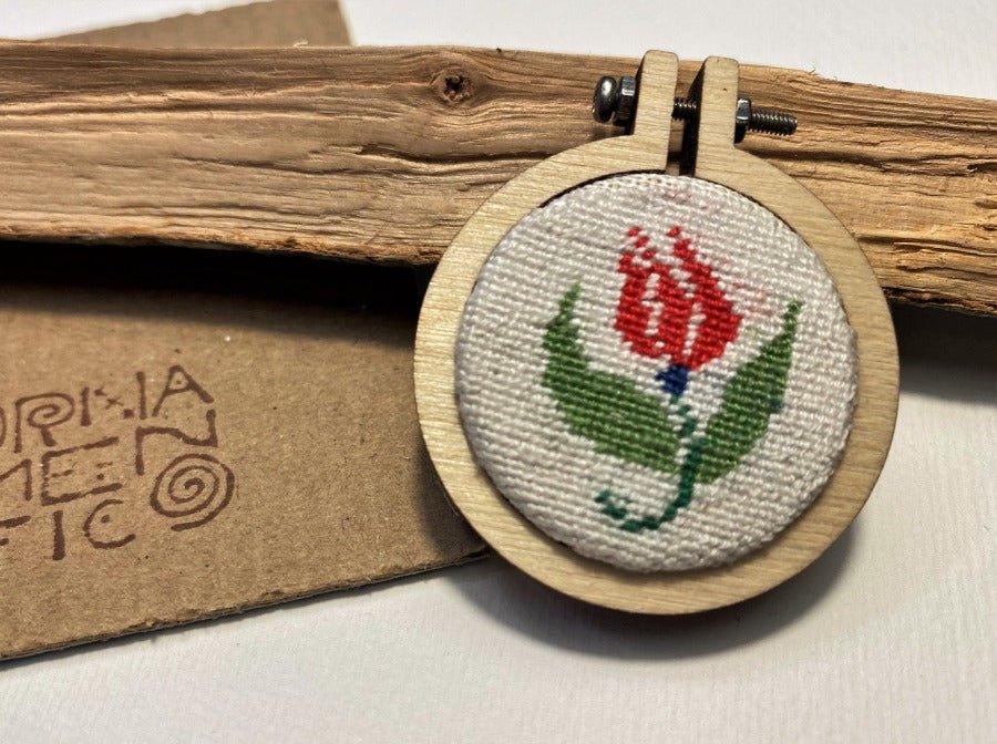 Unique handmade embroidered pendant in a round wooden frame. Collection "Ornaments of Turkey"