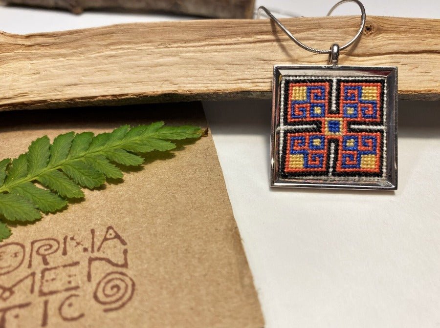 Unique handmade embroidered pendant in a silver frame. Collection "Carpets of Anatolia" - Ornamentico shop
