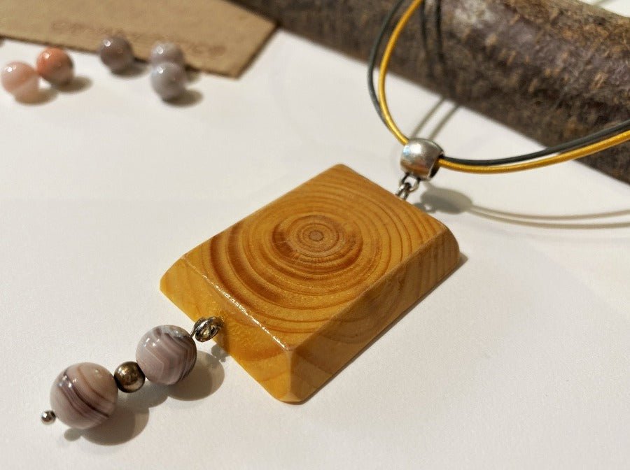 Handmade small wooden pendant crafted from beech wood. Complimented with two agate stones - Ornamentico shop