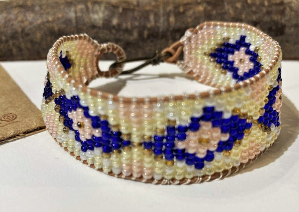 Handmade beaded bracelet crafted in weaved technique in elegant beige and blue color pallet - Ornamentico shop