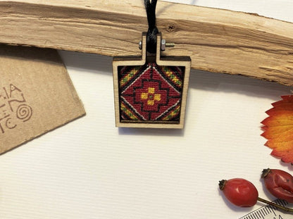 Unique handmade embroidered pendant in a square wooden frame. Collection "Carpets of Anatolia" - Ornamentico shop