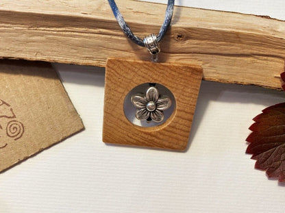 Square wooden pendant with silver inlay in the shape of a flower. Beech, silver - Ornamentico shop