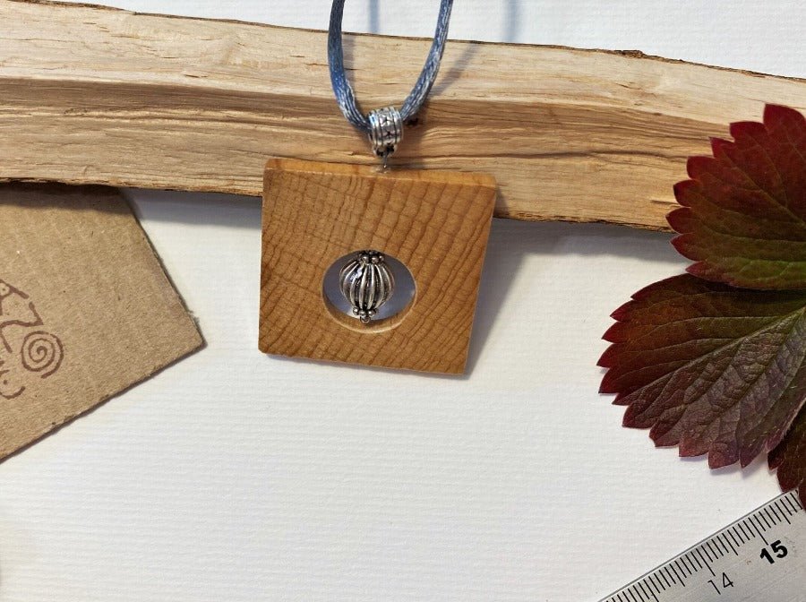 Handmade square wooden pendant with a silver bead inlay. Beech, silver - Ornamentico shop