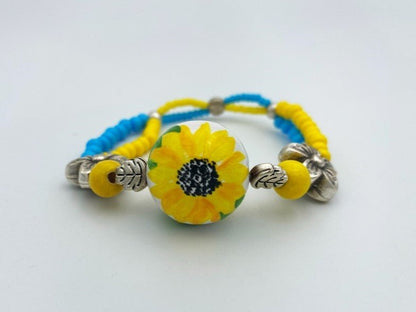 Boho style bracelet from wooden beads crafted from hand-painted wooden bead in colors of Ukrainian flag - Ornamentico shop