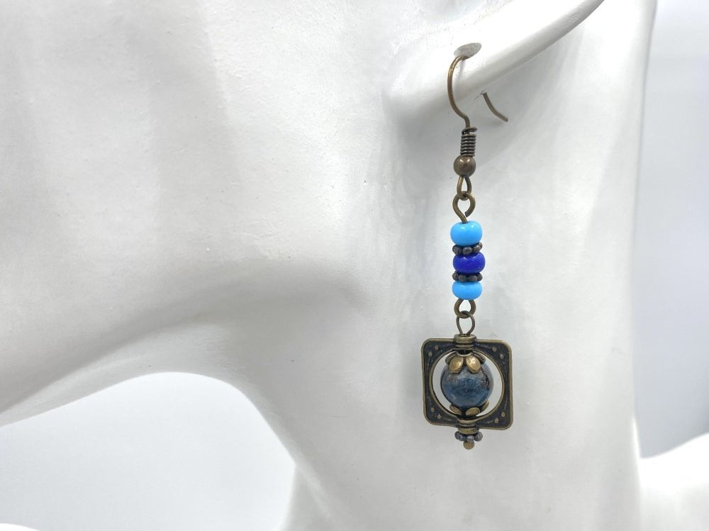 Handmade earrings with shattuckite stone from South Africa framed in bronze floral fitting - Ornamentico shop