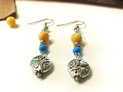 Handmade earrings with amber bead with silver charm. Silver fittings, Baltic amber stone, color beads - Ornamentico shop