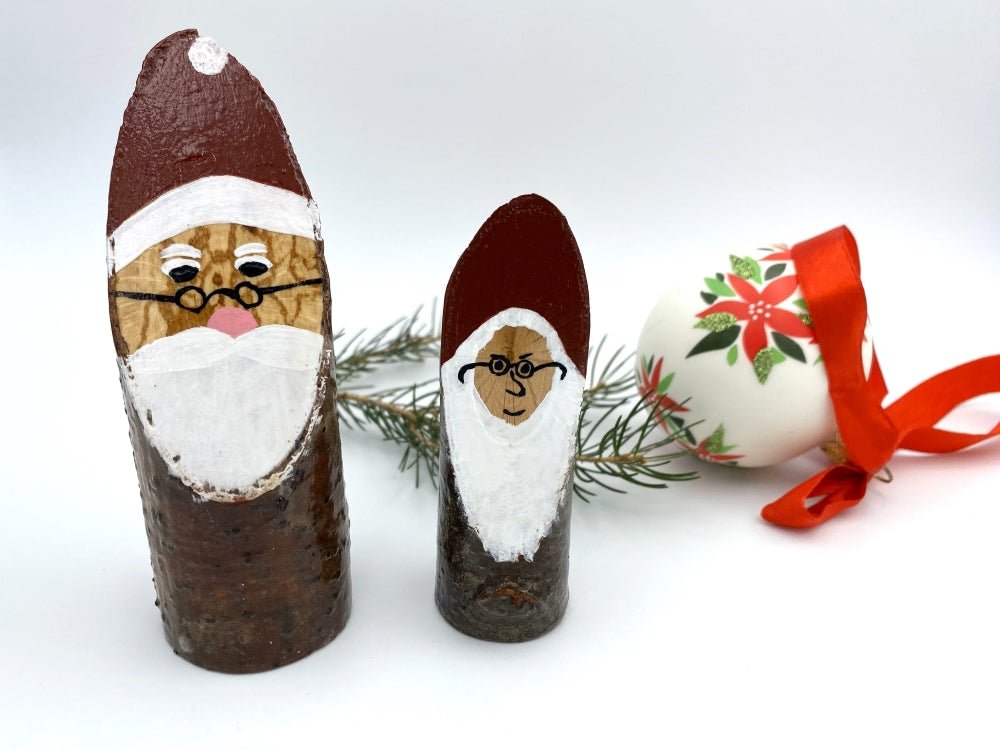 Handmade small wooden figurines of two Santas in glasses - Ornamentico shop