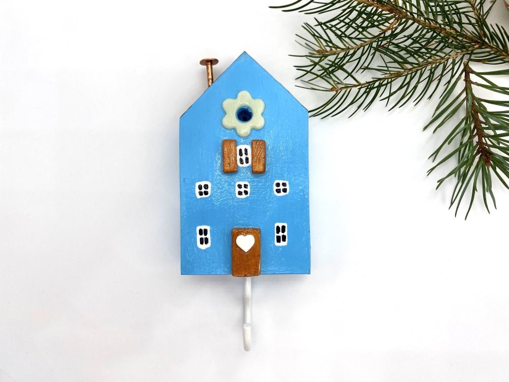 Handmade wooden hook crafted in the shape of a light blue house - Ornamentico shop