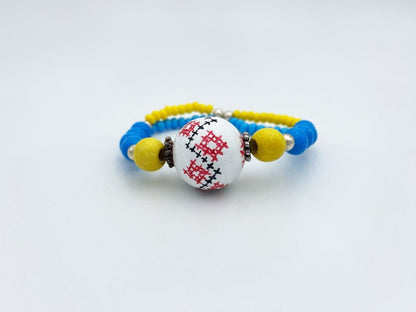 Handmade bracelet crafted in Boho style from hand painted wooden bead - Ornamentico shop