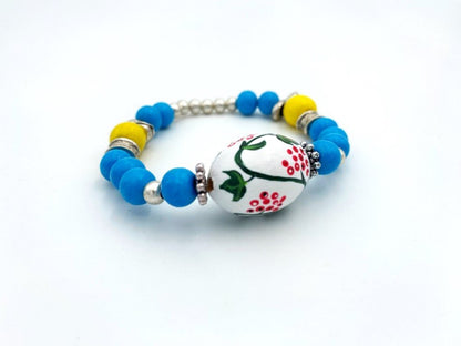 Boho style elegant bracelet from hand-painted wooden beads "Kalyna" crafted in colors of Ukrainian flag - Ornamentico shop