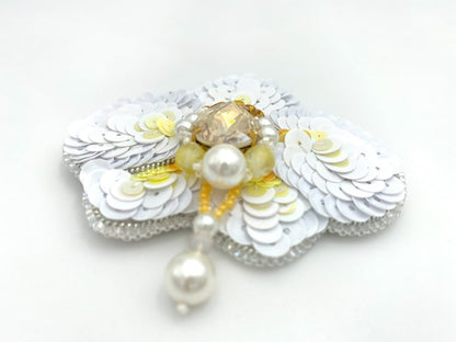 Brooch beaded from sequins, yellow agate, river pearl, rhinestone and beads in the shape of a white orchid - Ornamentico shop