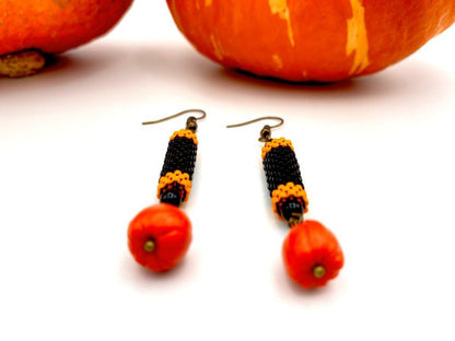Handmade earrings crafted with polymer clay pumpkin beads and inlays made from Japanese Miyuki beads - Ornamentico shop